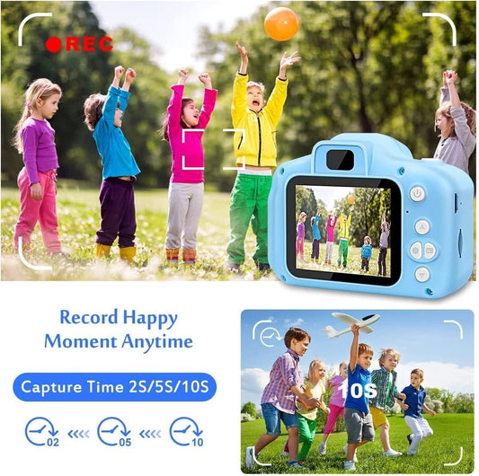 Children playing outdoors with a blue digital camera displaying recorded moments.